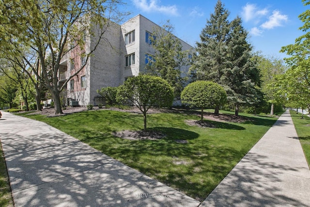 7841 W 157th St Unit 303, Orland Park, IL 60462 - view of community featuring a yard