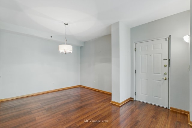 7841 W 157th St Unit 303, Orland Park, IL 60462 - unfurnished room with wood finished floors and baseboards