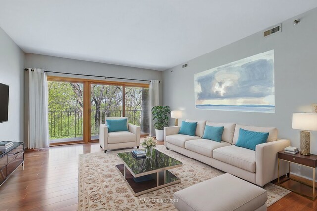 7841 W 157th St Unit 303, Orland Park, IL 60462 - living room featuring wood finished floors