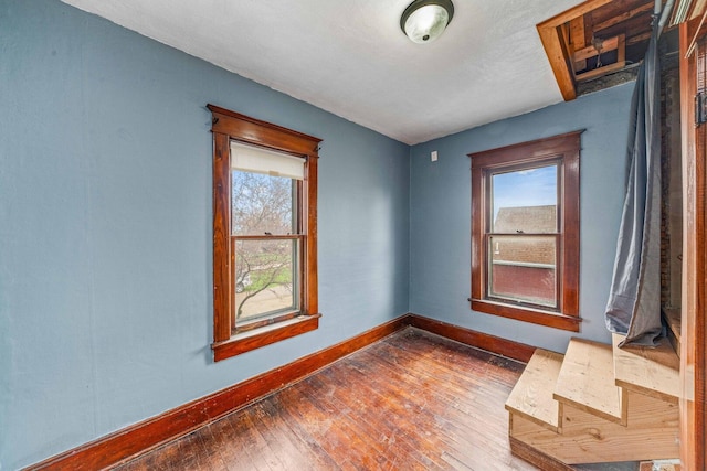 2523 Woods St, West Brooklyn, IL 61378 - unfurnished room featuring hardwood / wood-style floors and baseboards
