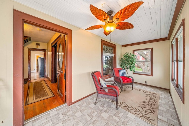 2523 Woods St, West Brooklyn, IL 61378 - sunroom / solarium featuring crown molding and baseboards