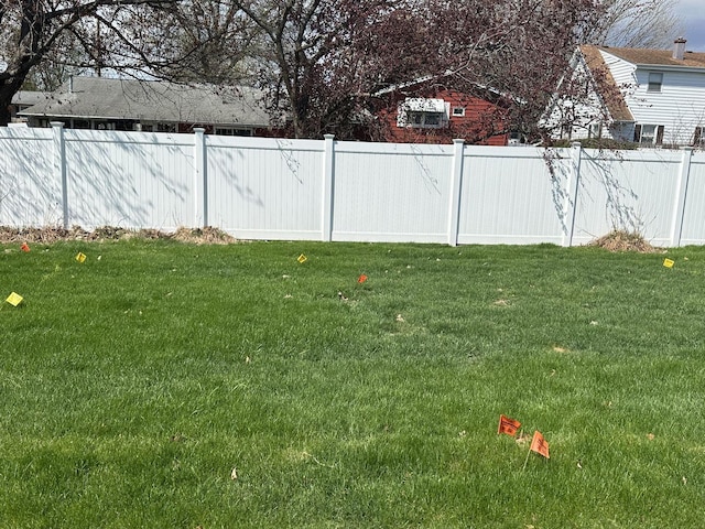 view of yard featuring fence