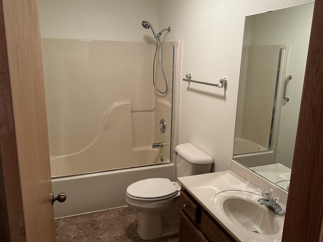 full bath with shower / bathtub combination, vanity, and toilet