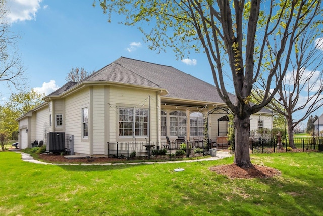 7160 Bannockburn Cir, Lakewood, IL 60014 - back of property with fence, a garage, cooling unit, and a lawn