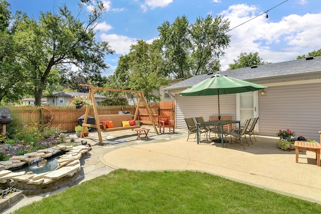 view of patio with fence