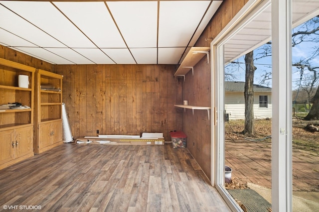 127 Tilton Park Dr, Dekalb, IL 60115 - empty room featuring wood finished floors and wood walls