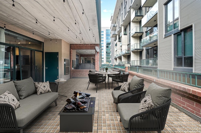 view of patio / terrace with an outdoor living space and outdoor dining space