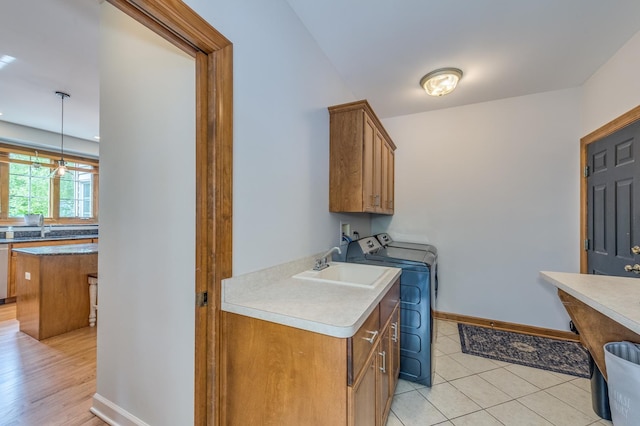 3908 Royal Portrush Dr, Naperville, IL 60564 - laundry area with cabinet space, independent washer and dryer, baseboards, and light tile patterned floors