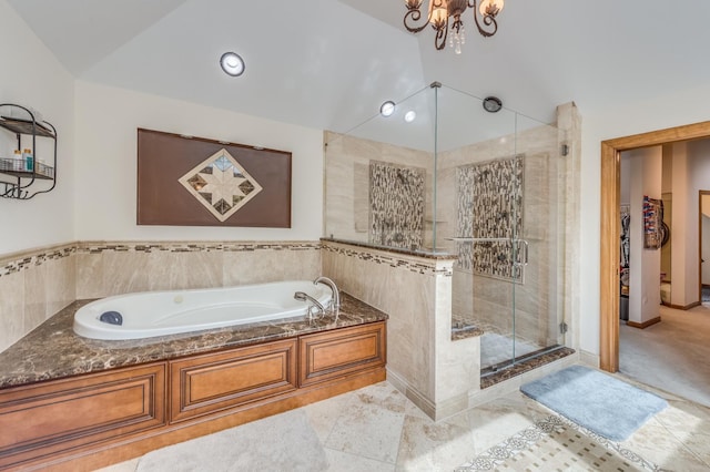 3908 Royal Portrush Dr, Naperville, IL 60564 - bathroom featuring a garden tub, a shower stall, a chandelier, vaulted ceiling, and a spacious closet