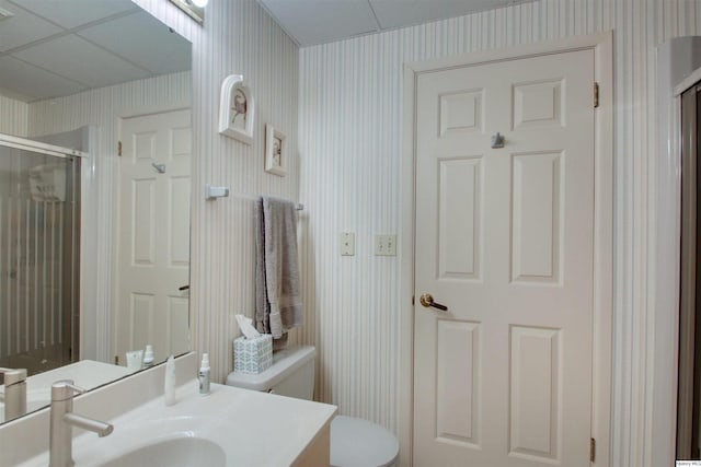 5620 Ridgeline Dr, Quincy, IL 62305 - full bath with wallpapered walls, vanity, toilet, and a stall shower