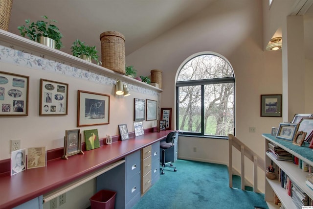 5620 Ridgeline Dr, Quincy, IL 62305 - carpeted home office with plenty of natural light, built in desk, high vaulted ceiling, and baseboards