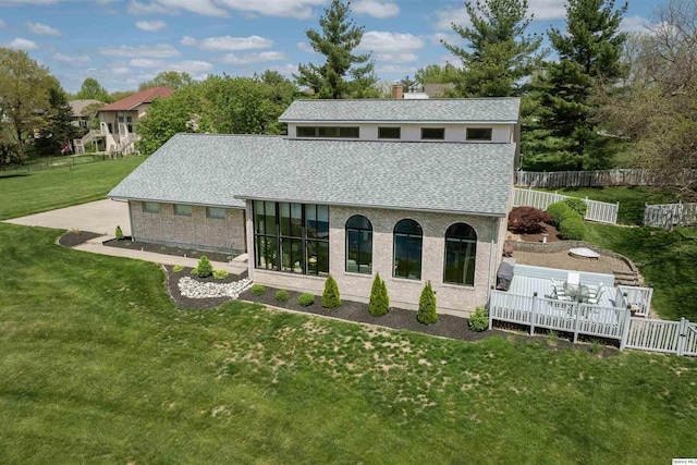 5620 Ridgeline Dr, Quincy, IL 62305 - back of house featuring roof with shingles and a chimney