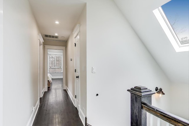 2642 N Drake Ave, Chicago, IL 60647 - hall with recessed lighting, visible vents, an upstairs landing, dark wood-type flooring, and a skylight