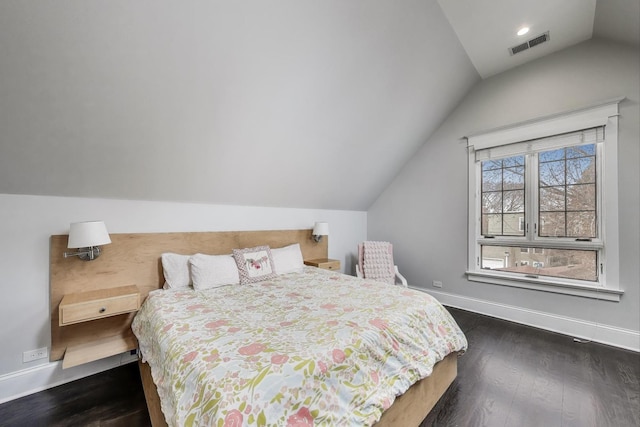 2642 N Drake Ave, Chicago, IL 60647 - bedroom featuring dark wood-style floors, lofted ceiling, visible vents, and baseboards
