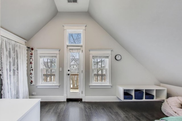 2642 N Drake Ave, Chicago, IL 60647 - additional living space with dark wood finished floors, lofted ceiling, visible vents, and plenty of natural light