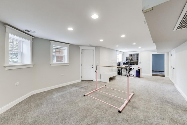 2642 N Drake Ave, Chicago, IL 60647 - below grade area with light carpet, baseboards, visible vents, and recessed lighting