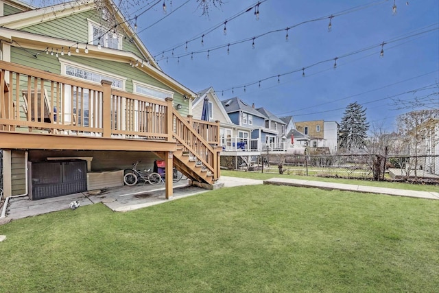 2642 N Drake Ave, Chicago, IL 60647 - view of yard with a residential view, stairs, fence, and a deck