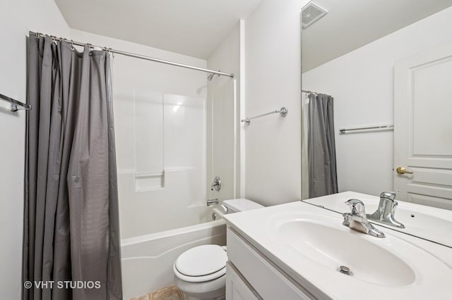 bathroom featuring vanity, shower / bath combination with curtain, toilet, and visible vents