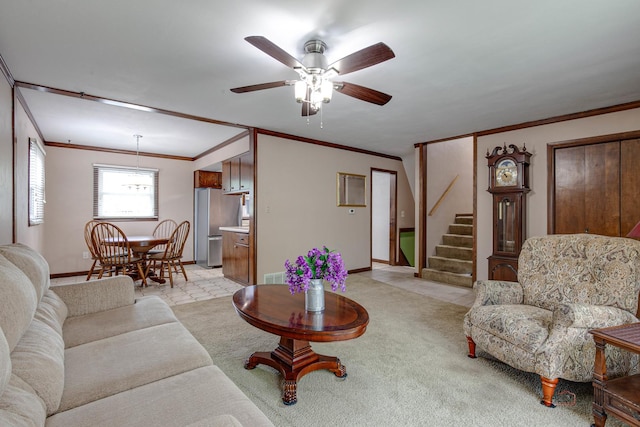 33170 N Battershall Rd, Grayslake, IL 60030 - living room featuring ornamental molding, stairs, ceiling fan, baseboards, and light colored carpet