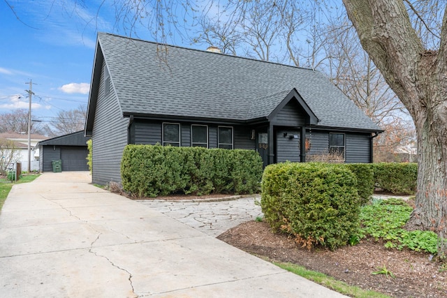 5802 Tennessee Ave, Clarendon Hills, IL 60514 - view of front facade with a chimney, a detached garage, and a shingled roof
