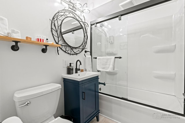 5802 Tennessee Ave, Clarendon Hills, IL 60514 - bathroom featuring vanity, visible vents, toilet, and shower / bath combination with glass door