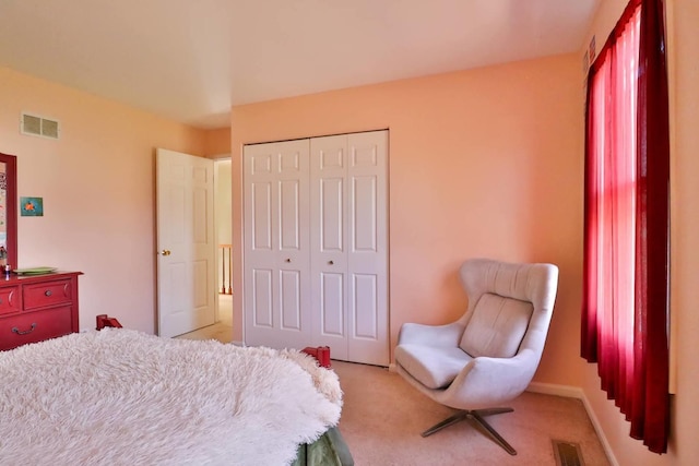 406 Woodcroft Ln, Schaumburg, IL 60173 - bedroom with a closet, visible vents, and light colored carpet