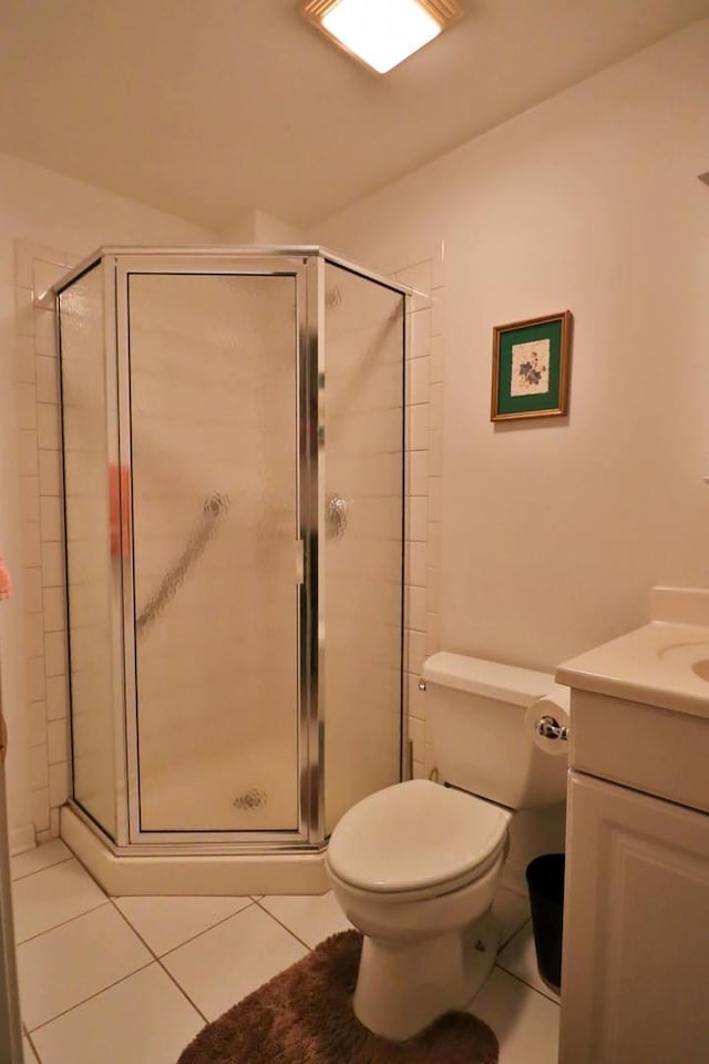 406 Woodcroft Ln, Schaumburg, IL 60173 - full bath with tile patterned floors, vanity, a shower stall, and toilet