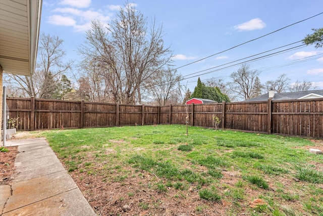 view of yard featuring a fenced backyard