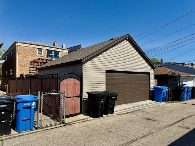 4941 N Kilpatrick Ave, Chicago, IL 60630 - detached garage featuring fence and a gate