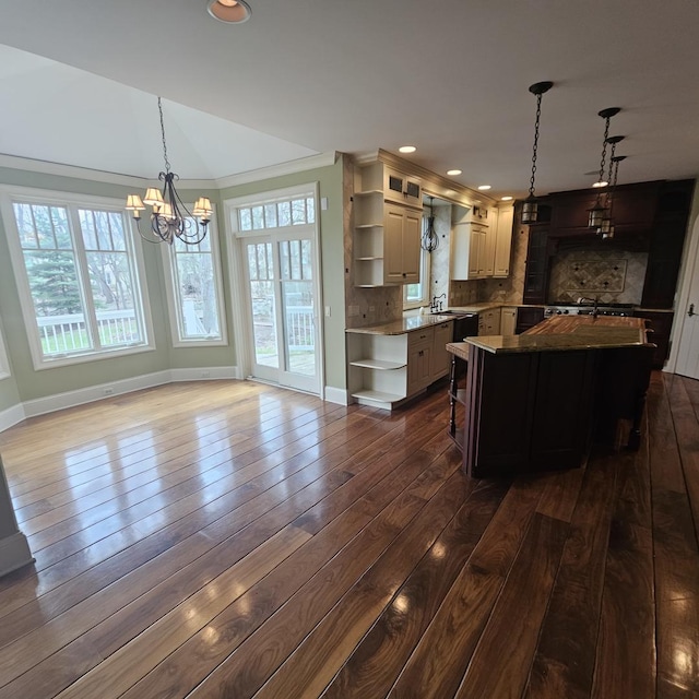 9065 Edinburgh Ct, Lakewood, IL 60014 - kitchen featuring baseboards, open shelves, a healthy amount of sunlight, and tasteful backsplash