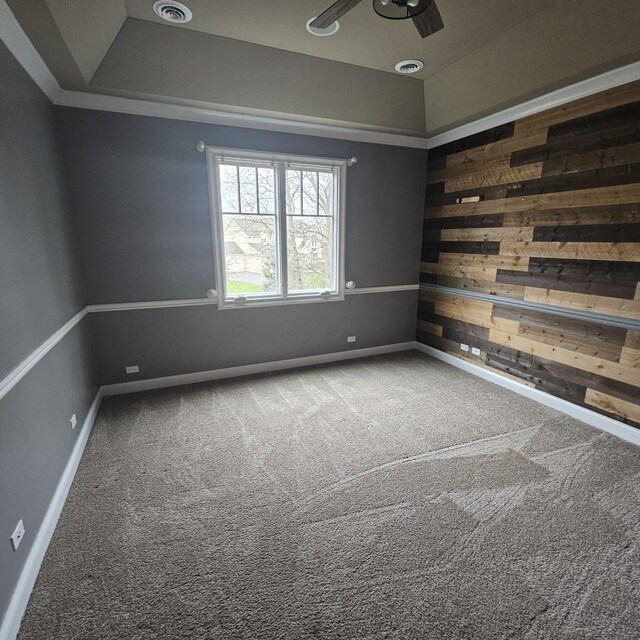 9065 Edinburgh Ct, Lakewood, IL 60014 - spare room with carpet flooring, ceiling fan, wood walls, and baseboards
