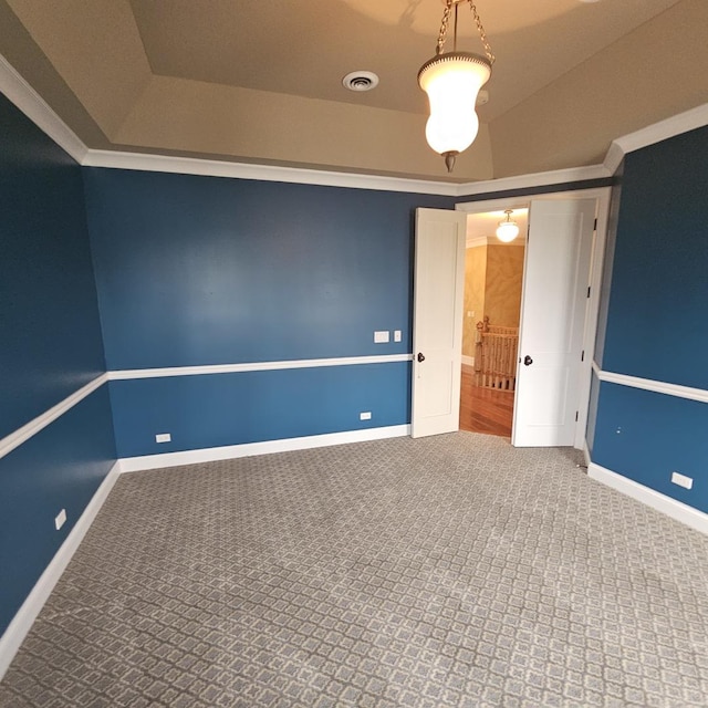 9065 Edinburgh Ct, Lakewood, IL 60014 - unfurnished bedroom with a raised ceiling, baseboards, carpet flooring, and visible vents