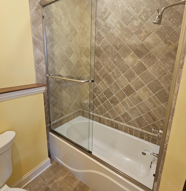 9065 Edinburgh Ct, Lakewood, IL 60014 - full bath featuring baseboards, combined bath / shower with glass door, and toilet
