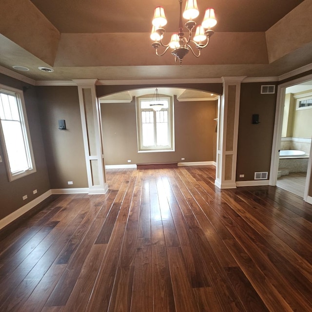 9065 Edinburgh Ct, Lakewood, IL 60014 - unfurnished room featuring arched walkways, baseboards, and visible vents