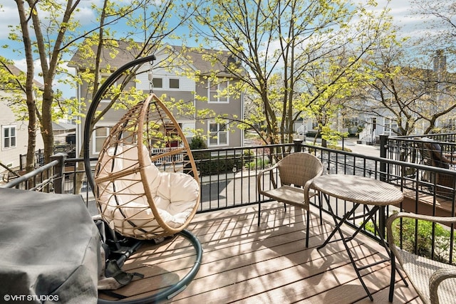 wooden deck with area for grilling