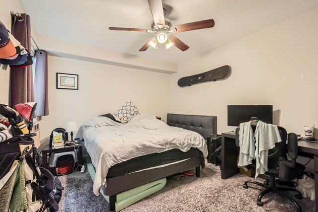 bedroom featuring ceiling fan and carpet flooring