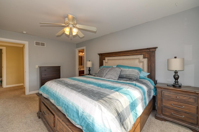 bedroom with light carpet, baseboards, and ceiling fan