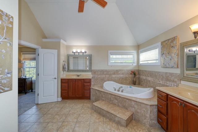 full bathroom featuring high vaulted ceiling, healthy amount of natural light, a ceiling fan, a bath, and tile patterned flooring
