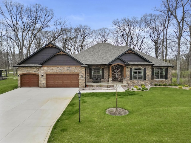 4220 166th Ln, Lowell, IN 46356 - craftsman-style house featuring a garage, a front lawn, concrete driveway, and stone siding