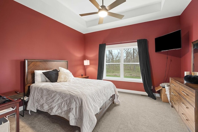 4220 166th Ln, Lowell, IN 46356 - bedroom with baseboards, ceiling fan, light colored carpet, and a tray ceiling