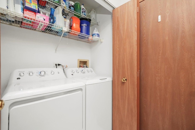 laundry area with laundry area and independent washer and dryer