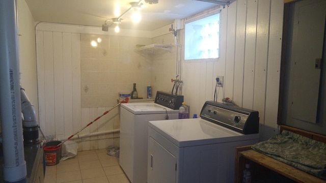 615 Price Ave, Calumet City, IL 60409 - laundry area with washing machine and dryer, tile patterned floors, and laundry area