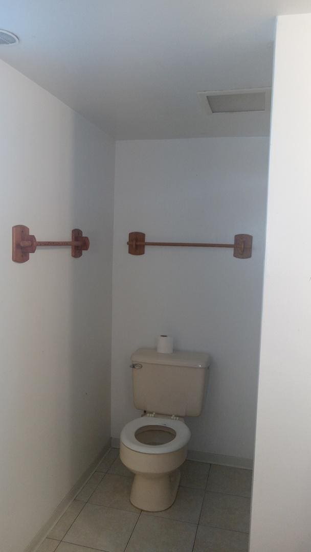 615 Price Ave, Calumet City, IL 60409 - bathroom featuring tile patterned flooring, baseboards, and toilet