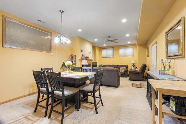 dining room with a ceiling fan, visible vents, recessed lighting, and light colored carpet