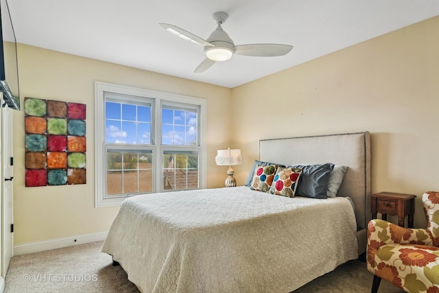 bedroom with baseboards, carpet, and ceiling fan