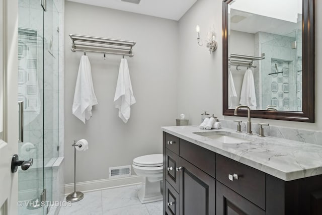 bathroom featuring toilet, visible vents, marble finish floor, and a stall shower