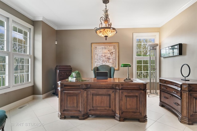 office space with crown molding, baseboards, visible vents, and a healthy amount of sunlight