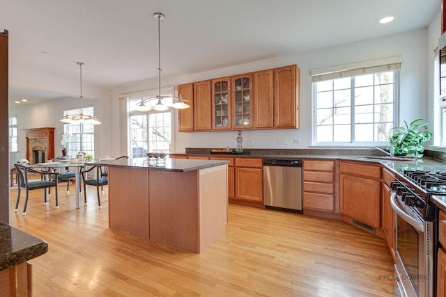 1330 Horizon Trl, Wheeling, IL 60090 - kitchen featuring light wood-style floors, appliances with stainless steel finishes, and a wealth of natural light