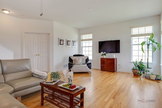 1330 Horizon Trl, Wheeling, IL 60090 - living area featuring baseboards, visible vents, and light wood-type flooring