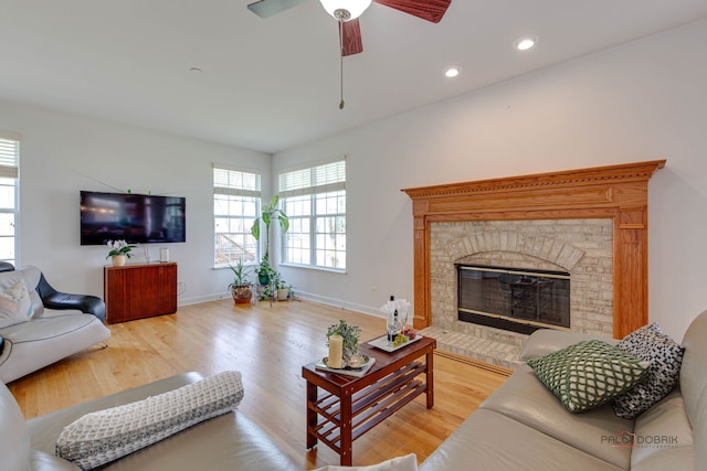 1330 Horizon Trl, Wheeling, IL 60090 - living room with a ceiling fan, baseboards, a glass covered fireplace, recessed lighting, and light wood-style flooring